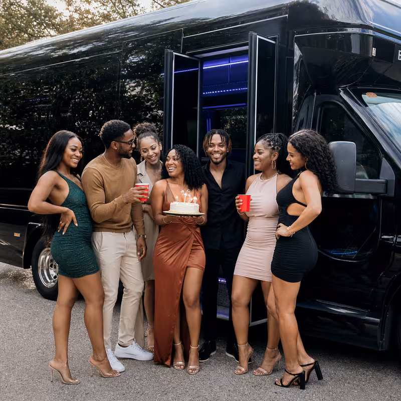 Party bus interior with wraparound leather seating and LED lighting in New Brunswick