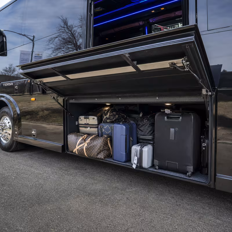 Party bus interior with wraparound leather seating and LED lighting in New Brunswick