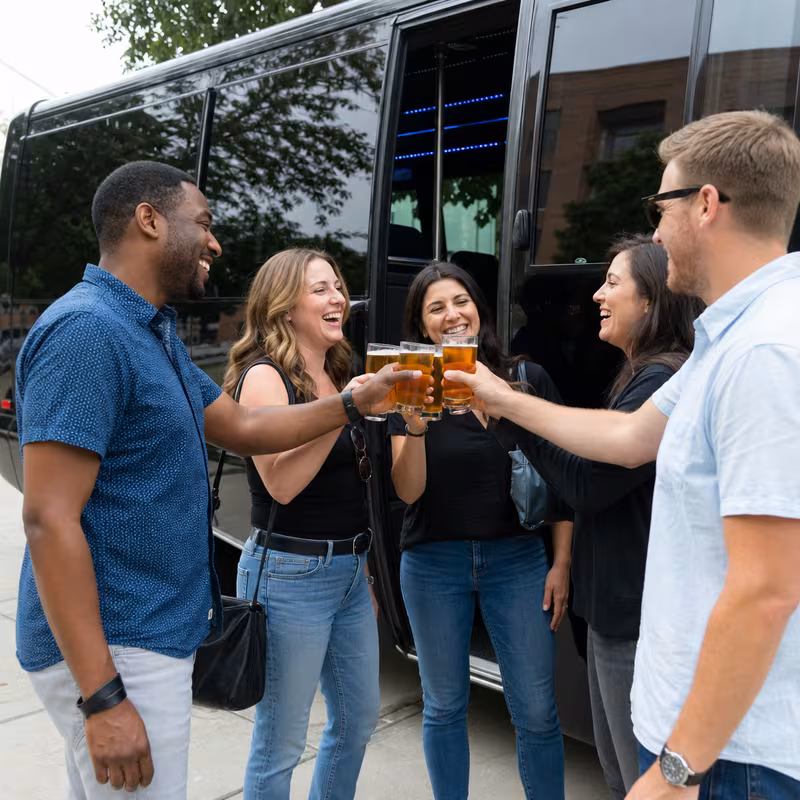 Passengers loading luggage while boarding an New Brunswick group shuttle